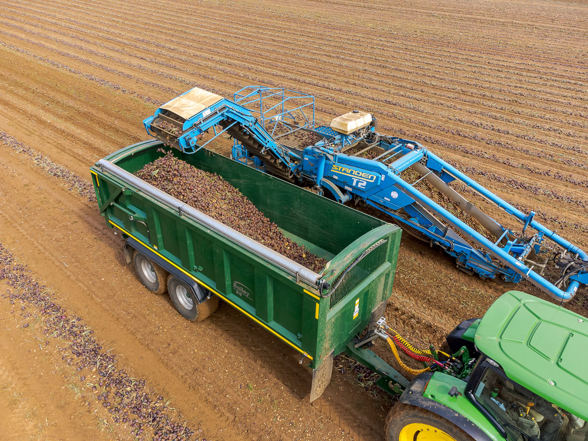 Filling the trailer in the field